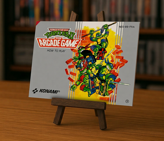 Jeu vidéo NES Teenage Mutant Hero Turtles II: The Arcade Game en français, avec console et cartouche visibles.