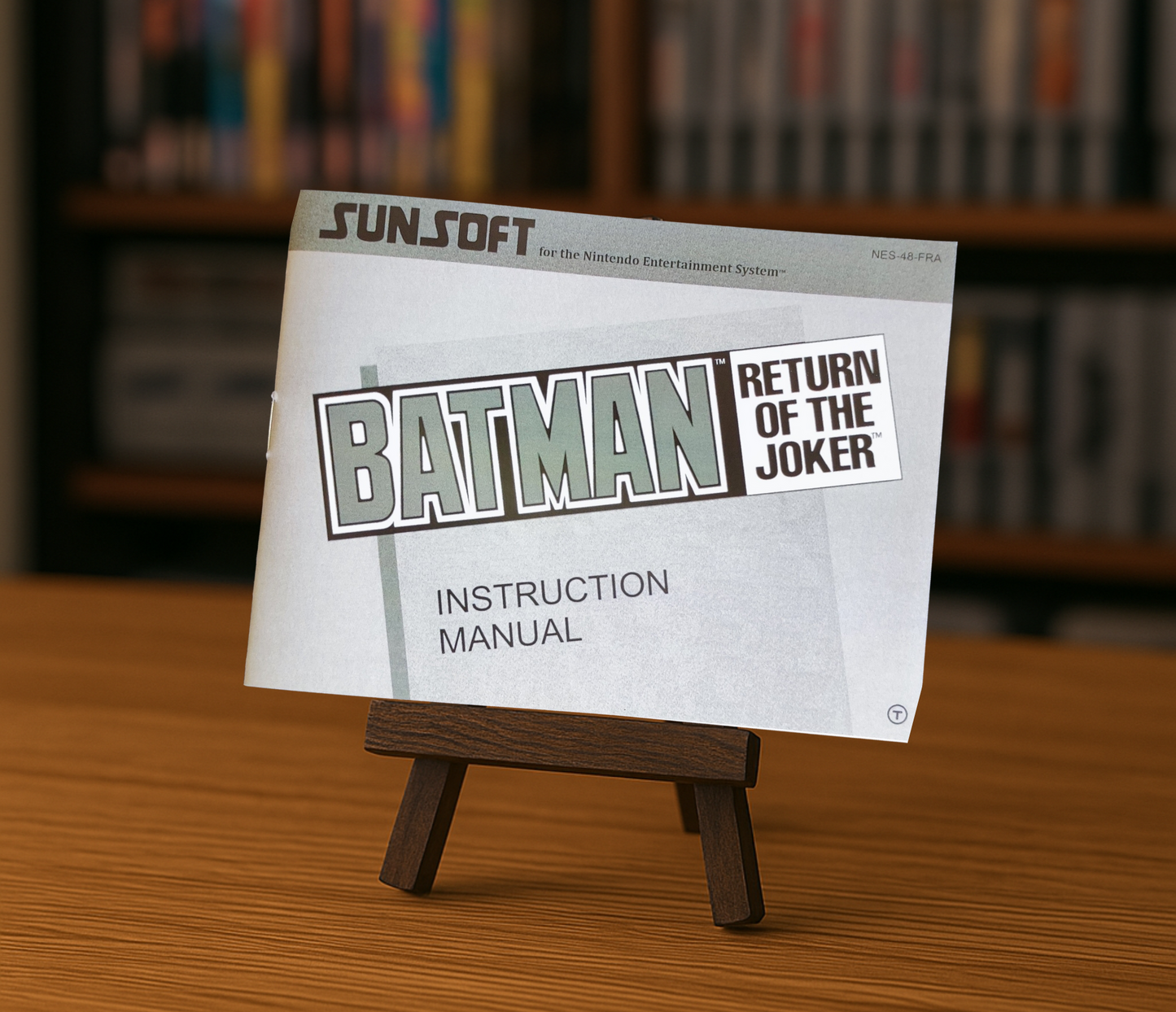 Affiche du jeu vidéo Batman : Return of the Joker pour NES, en français, avec le héros Batman en action.