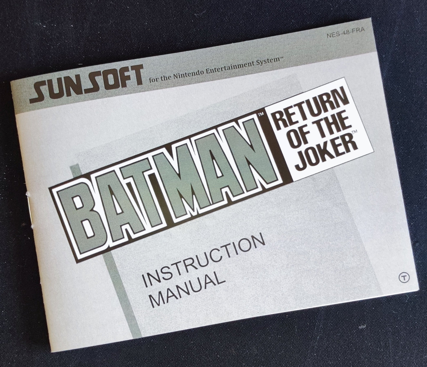 Aperçu de la notice en français pour Batman : Return of the Joker sur NES, avec texte et illustration du jeu.
